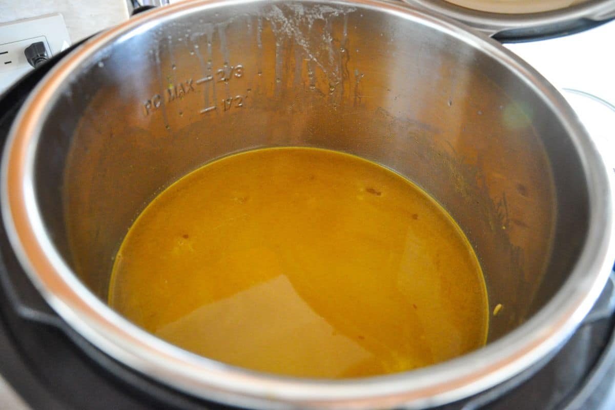 Add water and salt to the rice and lentils.