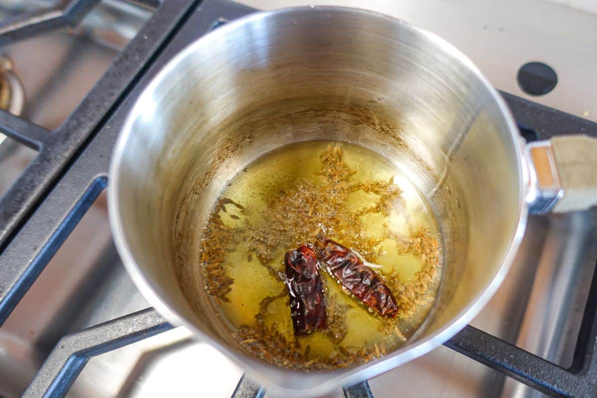 Tadka for Masoor Dal with dry red chilies added.