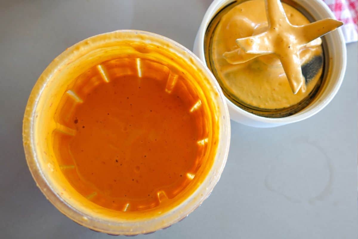 An open jar of creamy chipotle aioli.
