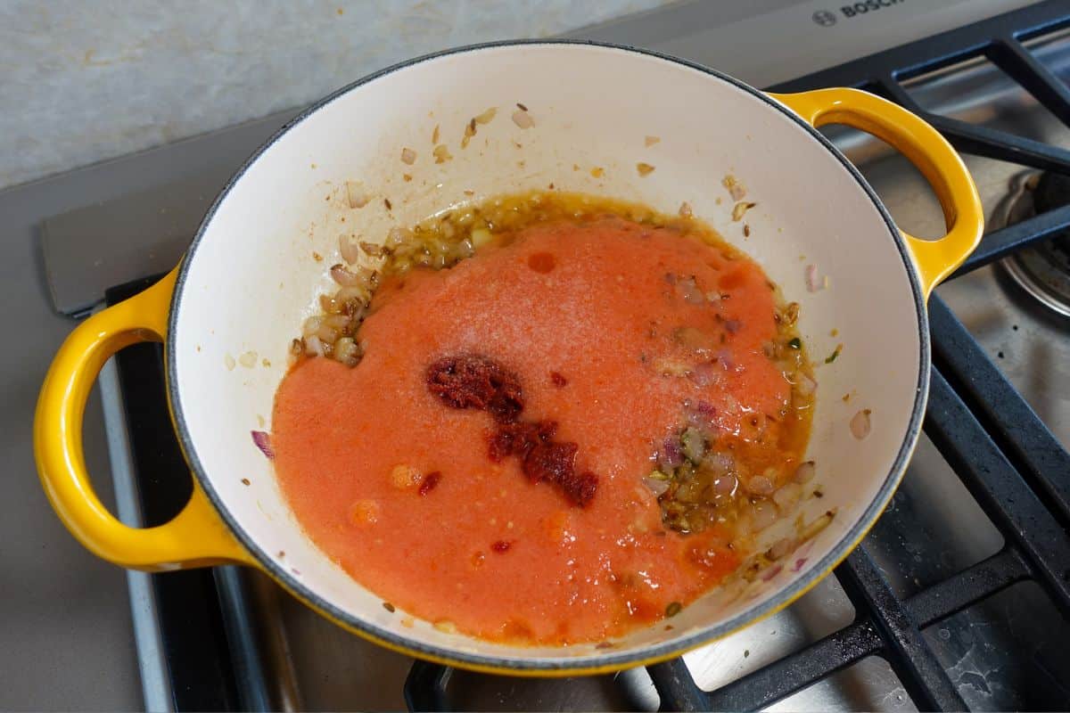 Add tomatoes and tomato paste.