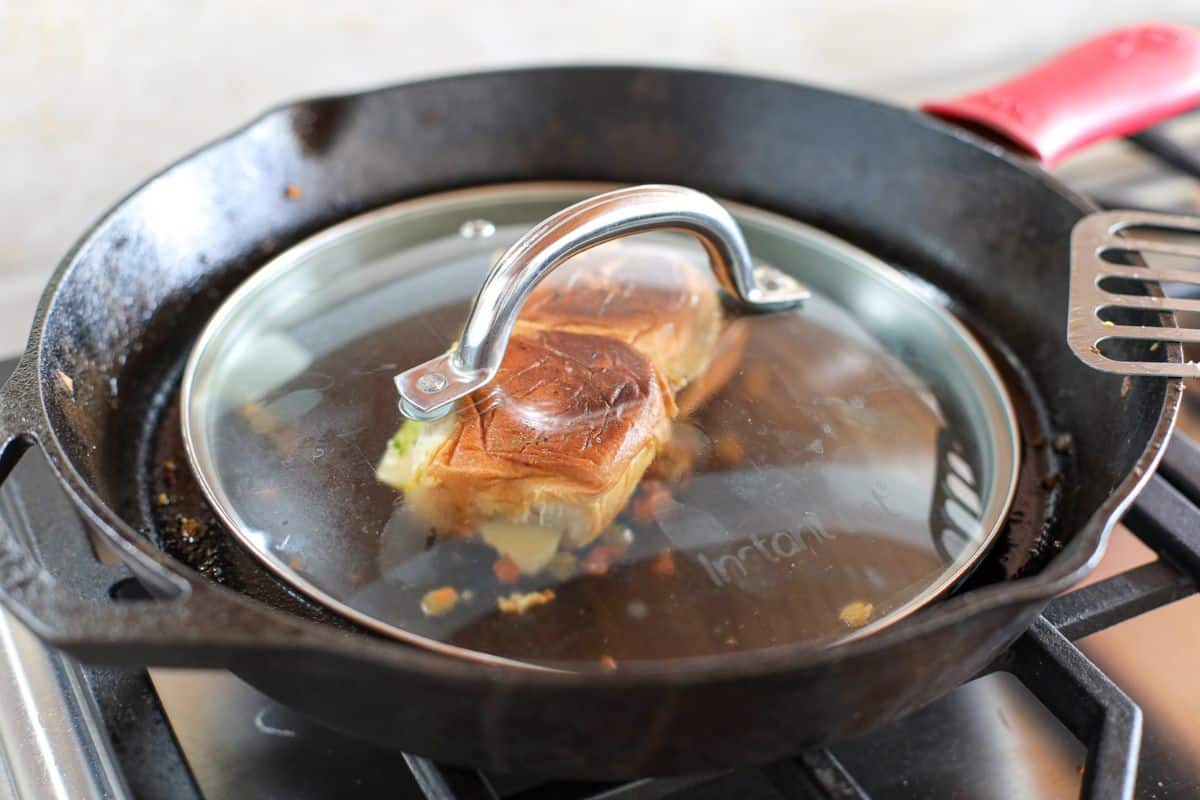 Cover and grill on both sides of slider.