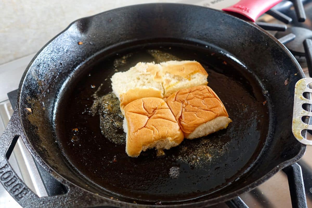 Add slider buns face side down over tandoori spiced butter.